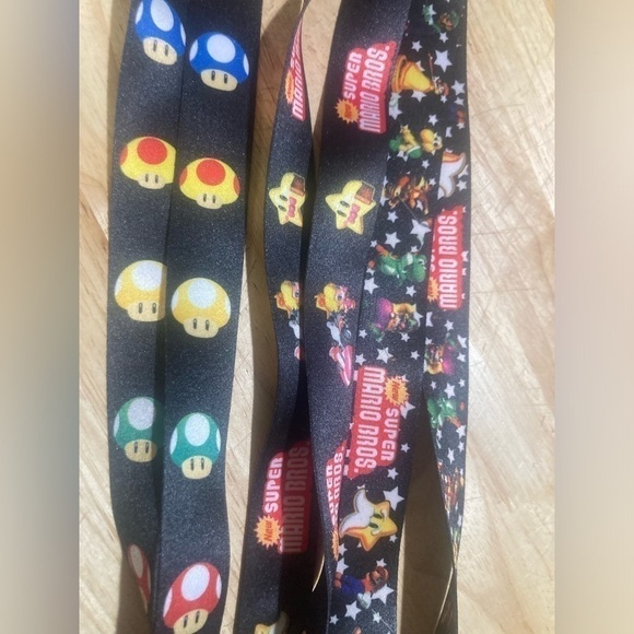 4/$25 Super Mario Brothers lanyard. You get all 3 for the $. 3 diff designs. - Picture 2 of 3